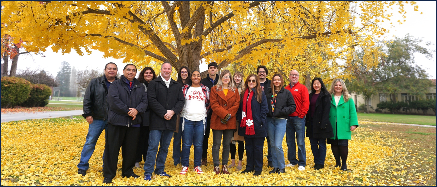 CHHS Staff 2025 CHHS Advising and Dean's Office staff in front of a Gingko tree