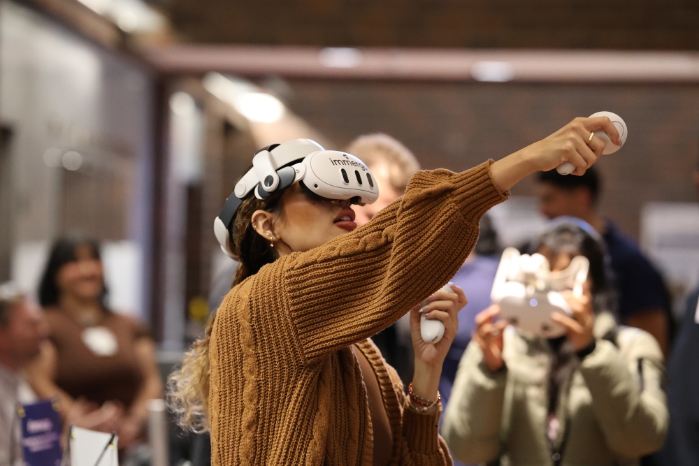 Individual wearing immergo virtual reality headset 