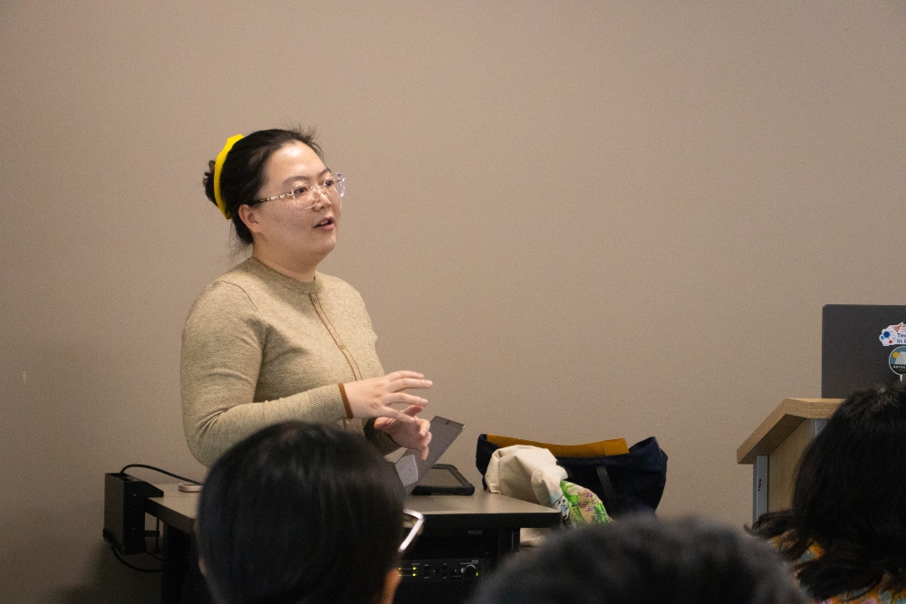 A student presenting to other students