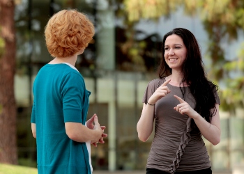 Two People Using Sign Language