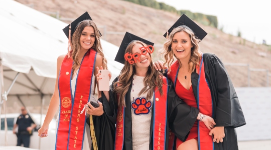 Fresno State graduates laughing