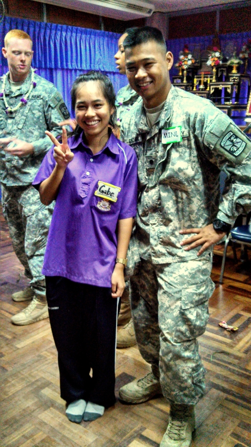 Cadet Gonzaga posing with a Thai High School Student during a meet and greet.