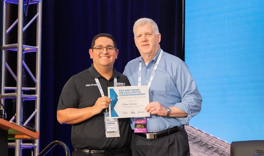 Joshua Salvador receiving award from SMA